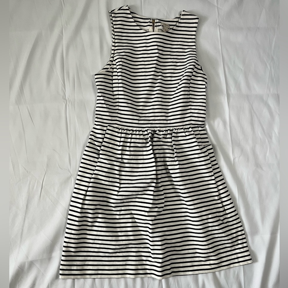 J.Crew.  Black and White striped dress with back zip. Pockets